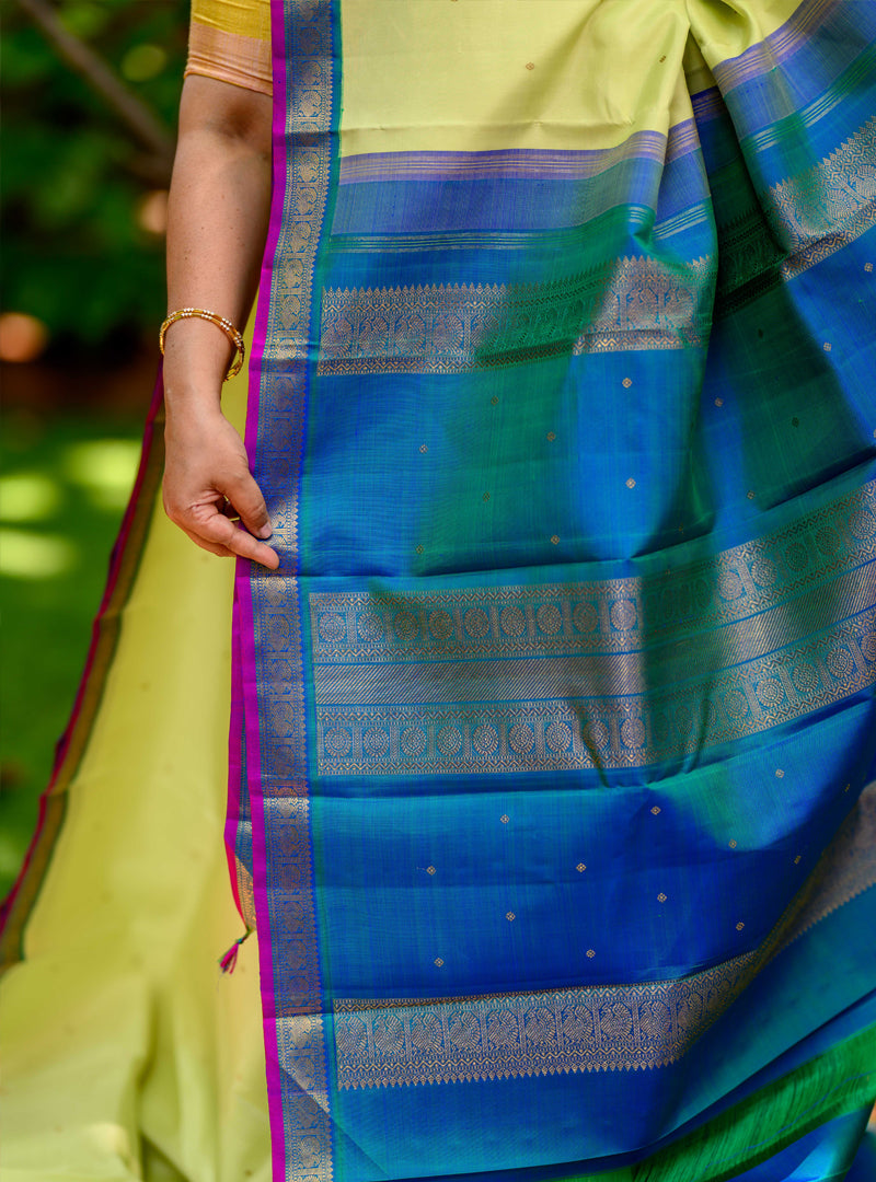 Apple green and peacock blue small border korvai kanchivaram
