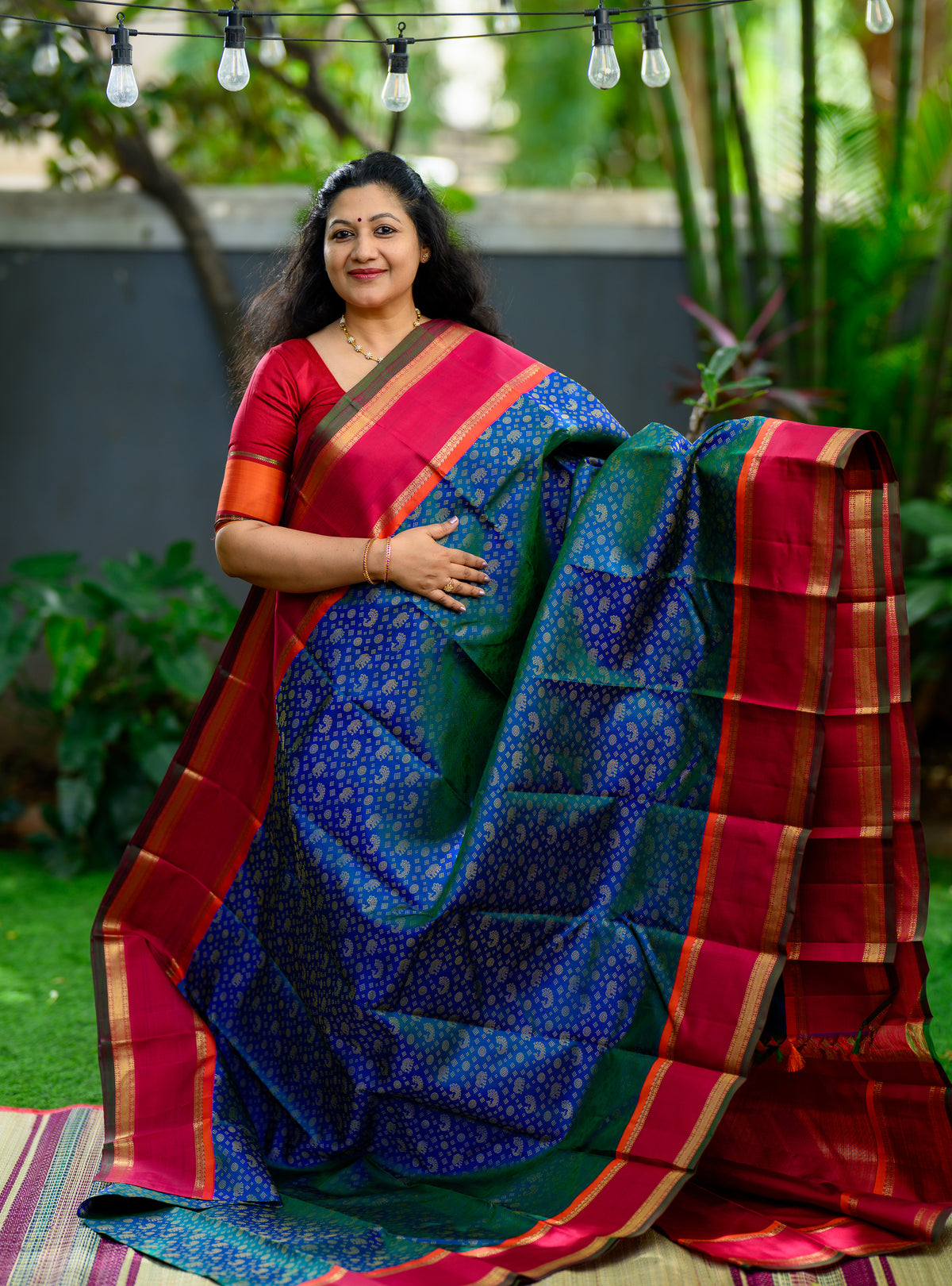 Korvai Kanjivaram with Peacock Green Body and Kalyana Arakku Border