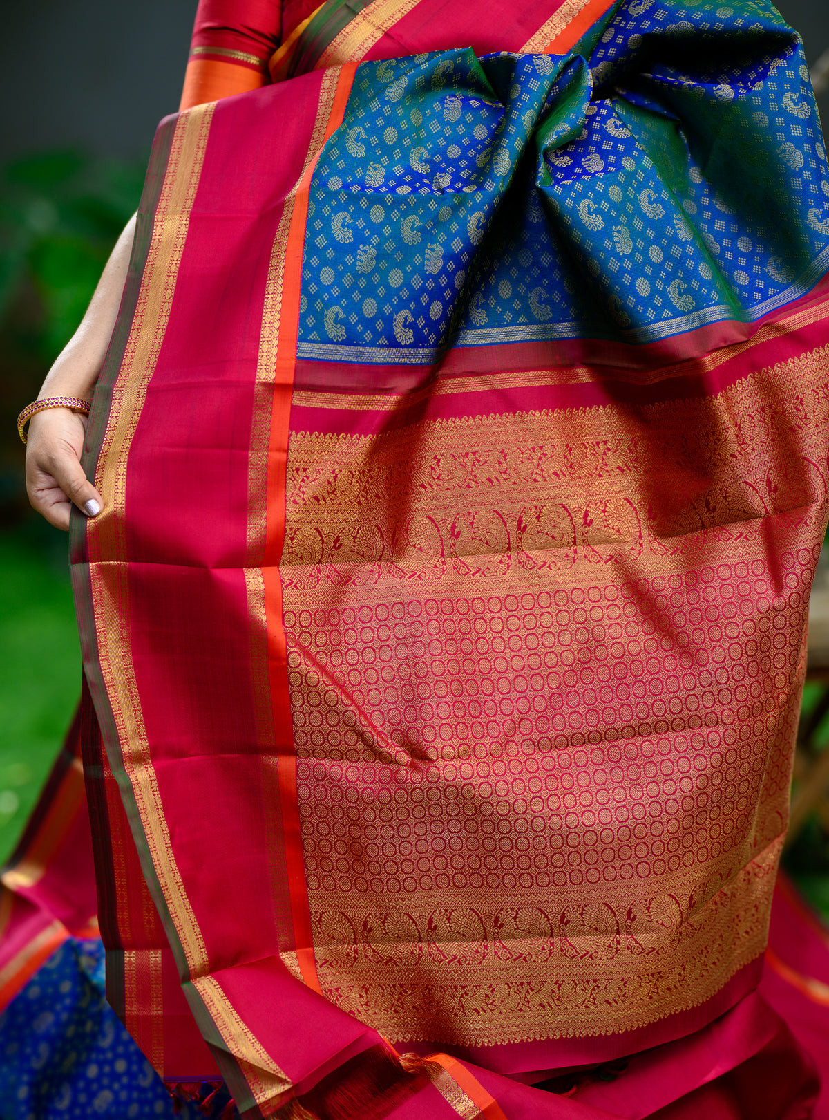 Korvai Kanjivaram with Peacock Green Body and Kalyana Arakku Border