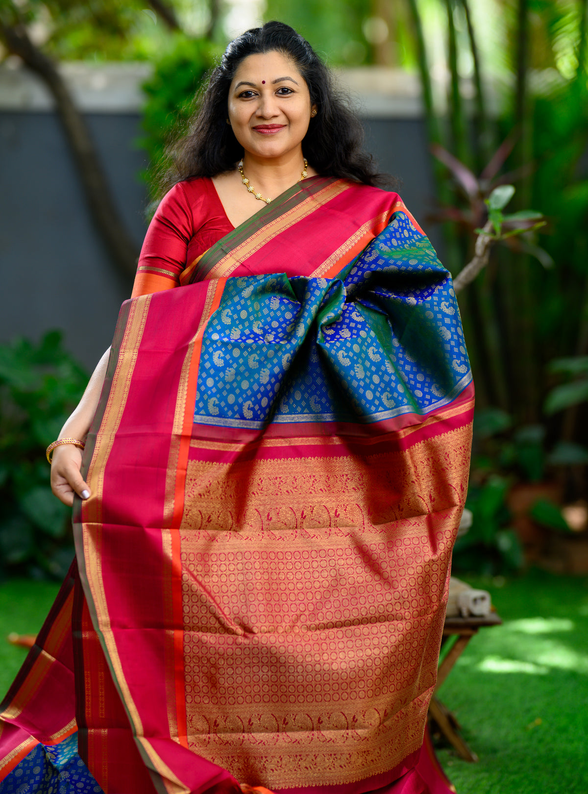 Korvai Kanjivaram with Peacock Green Body and Kalyana Arakku Border