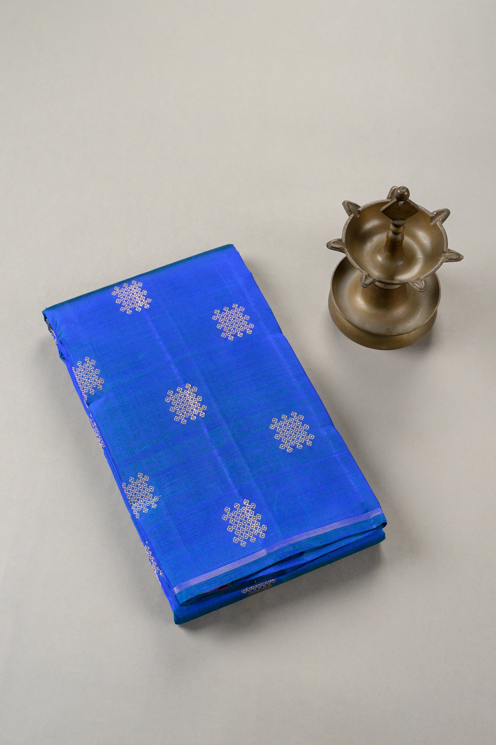 Borderless Royal blue with Kolam Butta and Grand Pallu