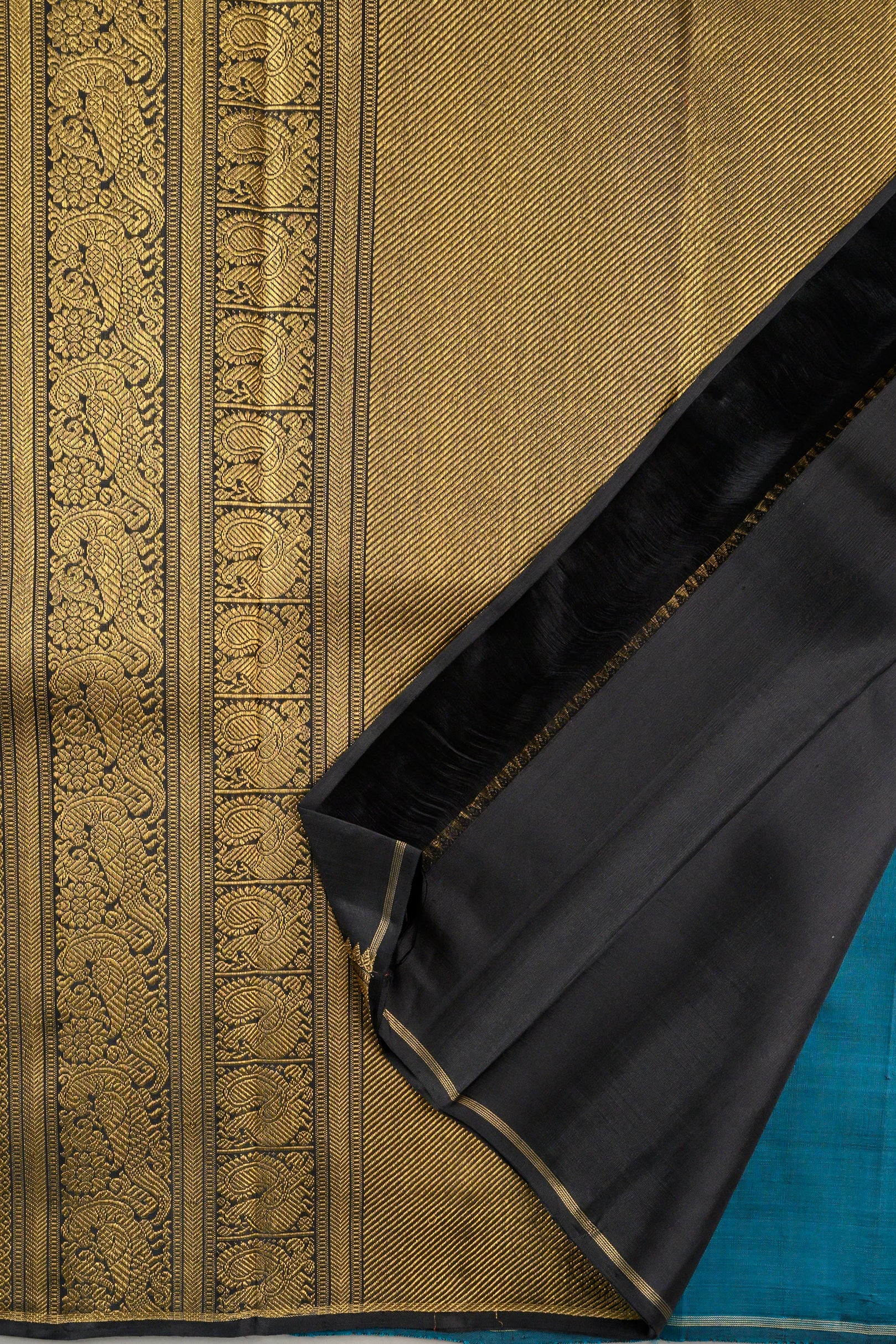 Borderless Teal blue with Kolam Butta and Grand Pallu