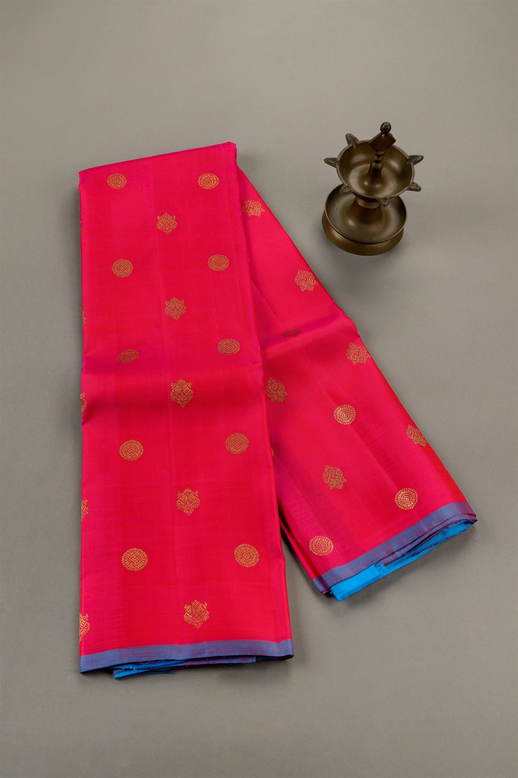 Borderless Vibrant Pink Saree with Jodi Mayil and Chakram buttas