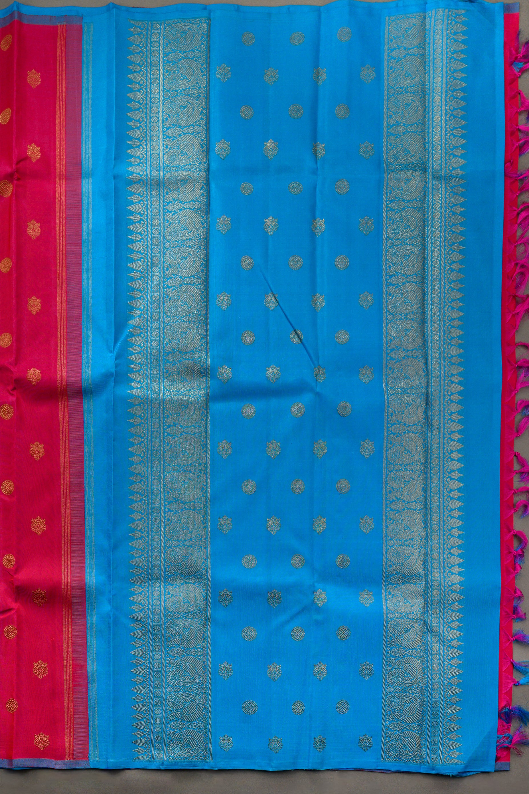 Borderless Vibrant Pink Saree with Jodi Mayil and Chakram buttas