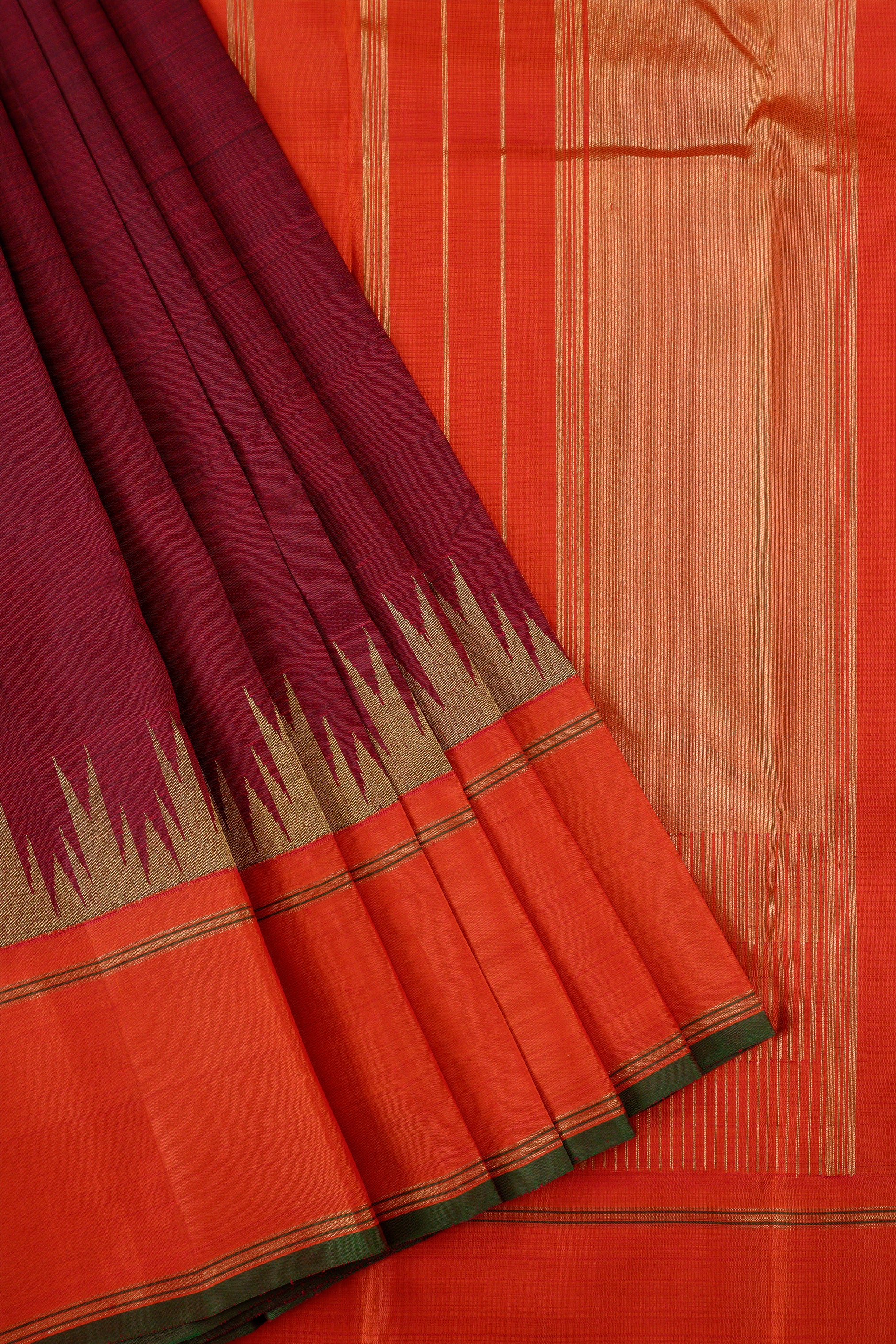 Ettu kol Korvai Kanjivaram with Pakku color (reddish brown) and Orange Border