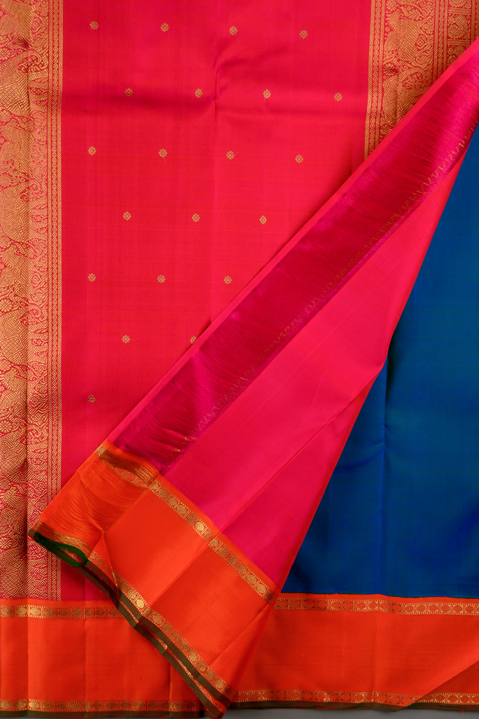 Mayilkazhuthu Blue Korvai Kanjivaram with Rettapettu Orange Border