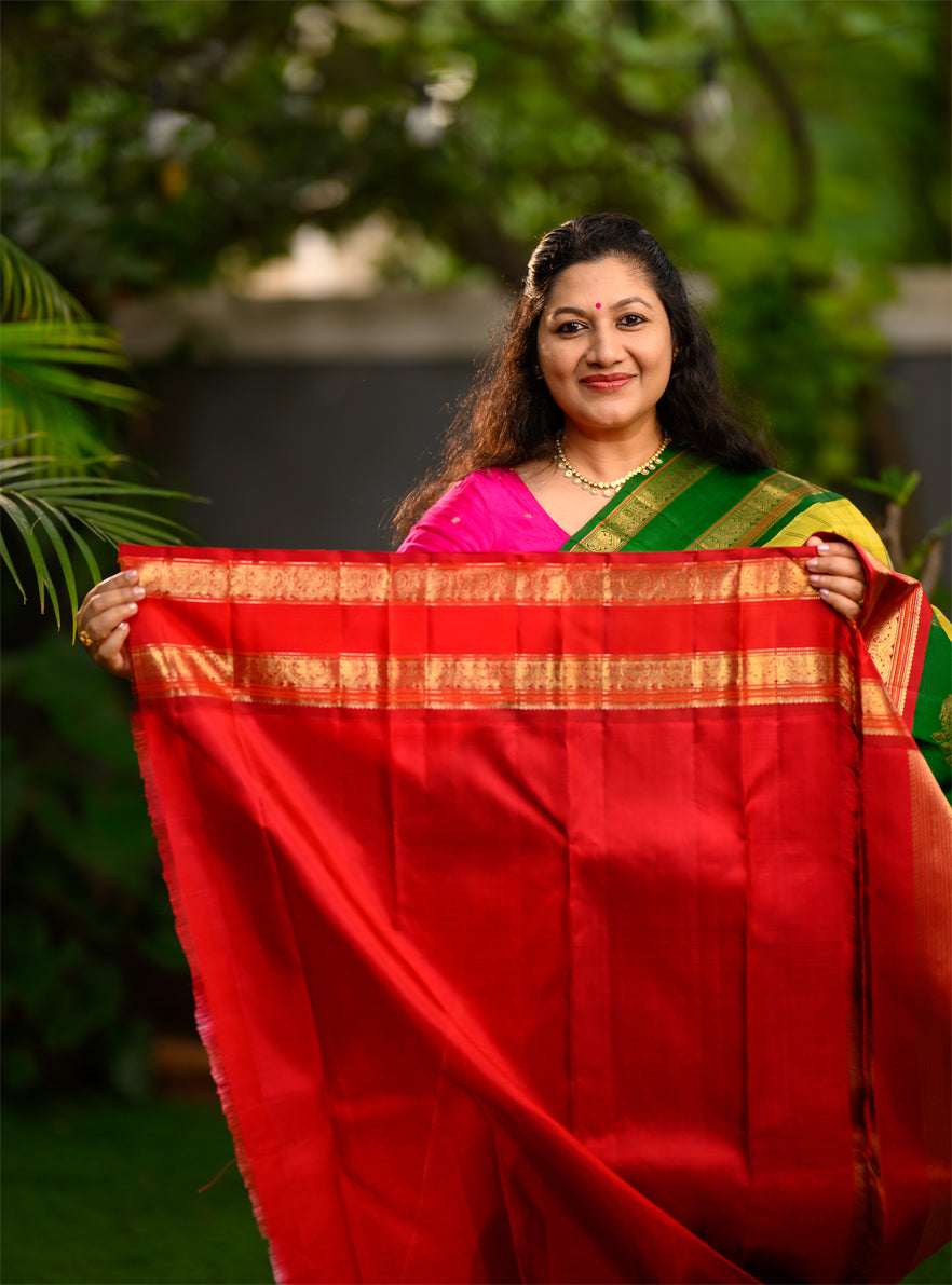 Pure silk, pure zari Kanchivaram Korvai Ganga Jamuna in Sampangi green, arakku red and emerald green.