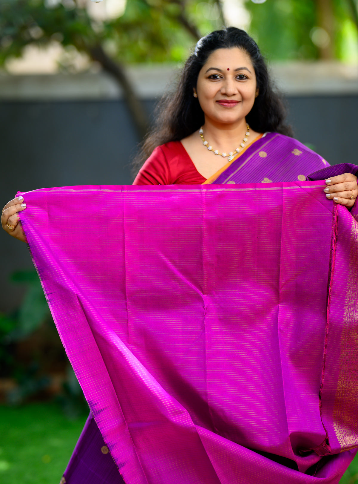 A beautiful Pure Silk Pure Zari Borderless Kanchivaram in a rich purple shade.