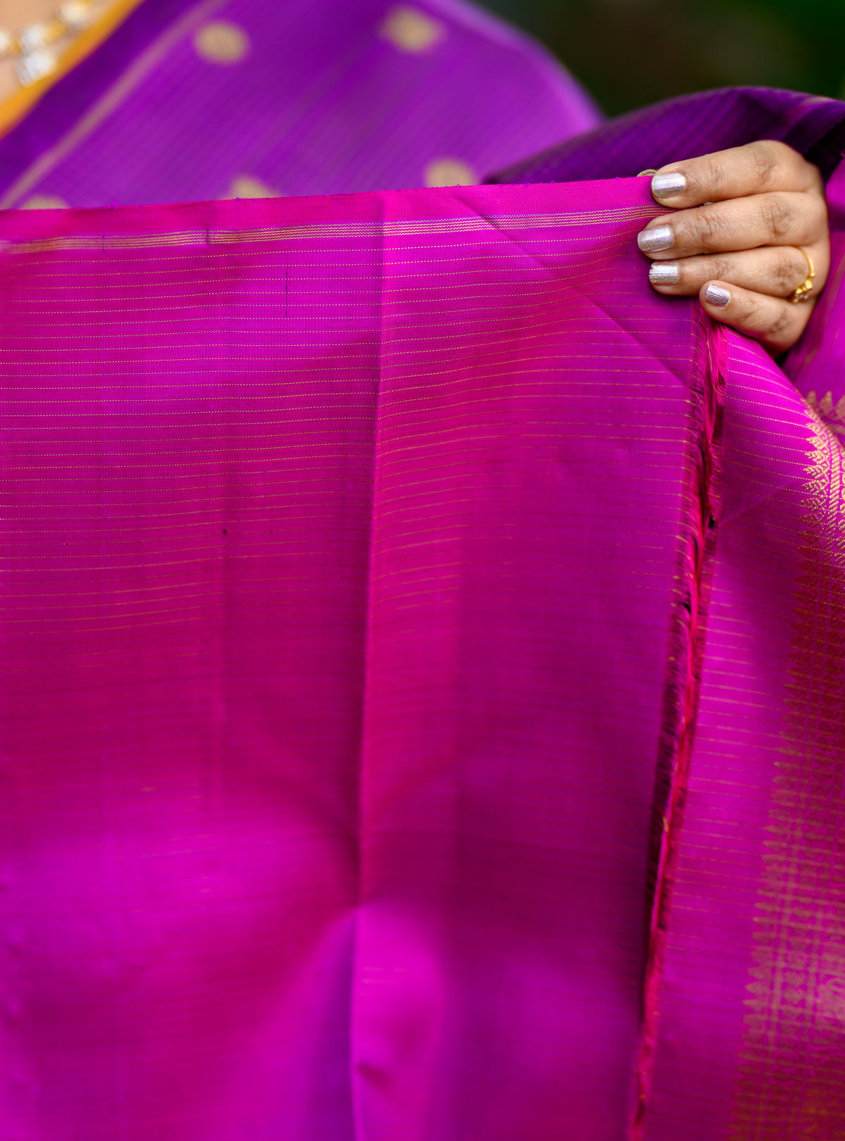 A beautiful Pure Silk Pure Zari Borderless Kanchivaram in a rich purple shade.