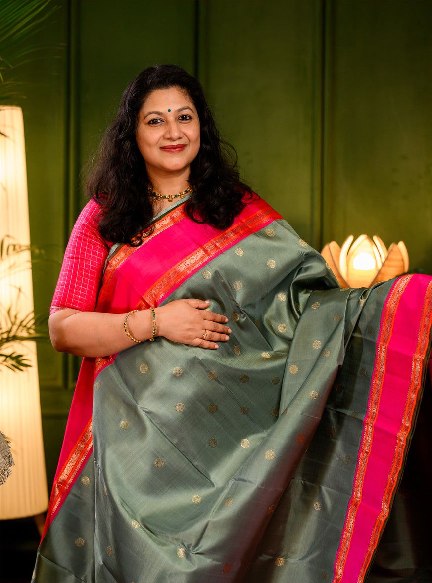 Elakkai Green and Rani Pink Korvai Kanjivaram
