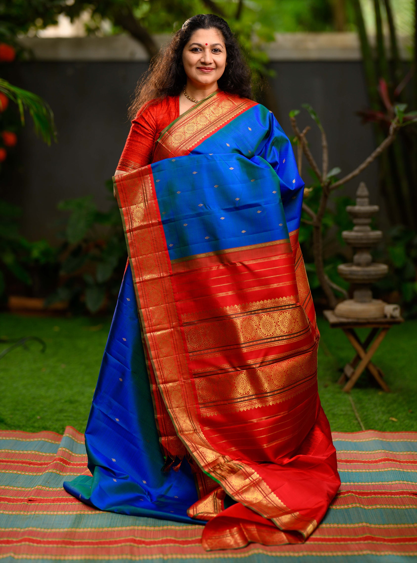Mayilkazhuthu Korvai Kanjivaram with arakku border