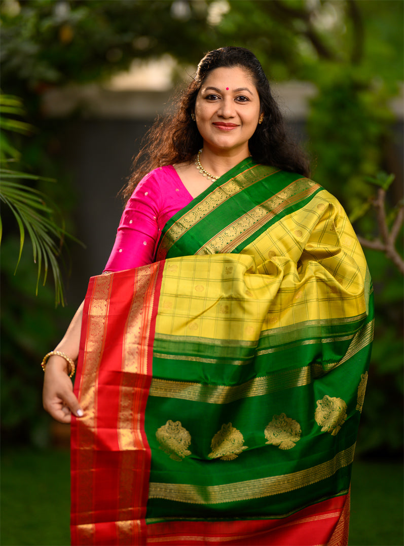 Pure silk, pure zari Kanchivaram Korvai Ganga Jamuna in Sampangi green, arakku red and emerald green.