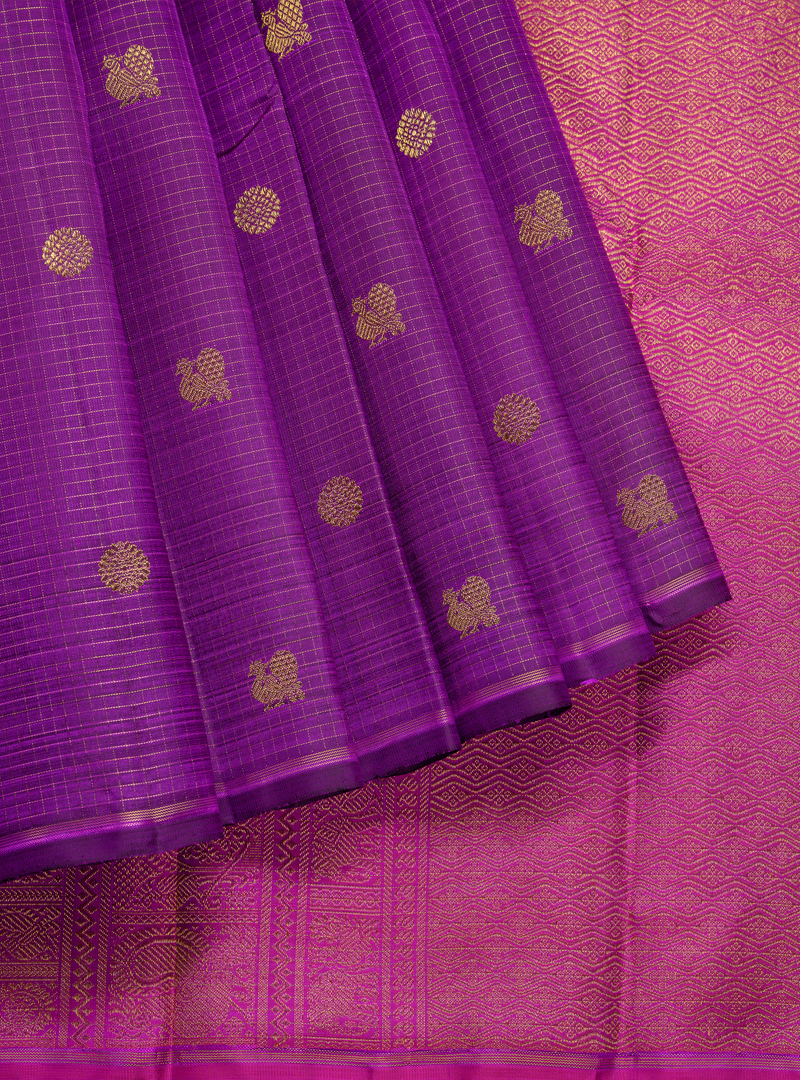 A borderless zari kattam kanchivaram in purple