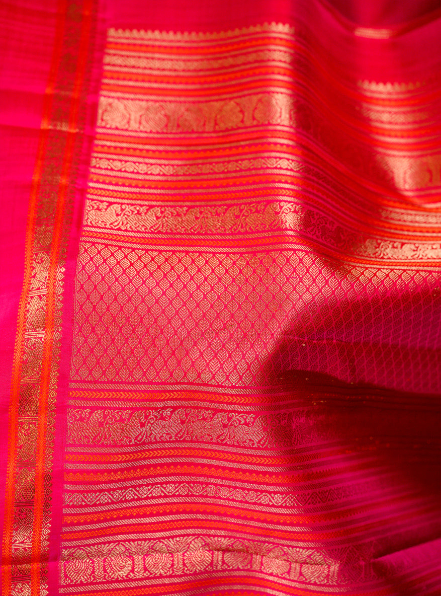 Elakkai Green and Rani Pink Korvai Kanjivaram
