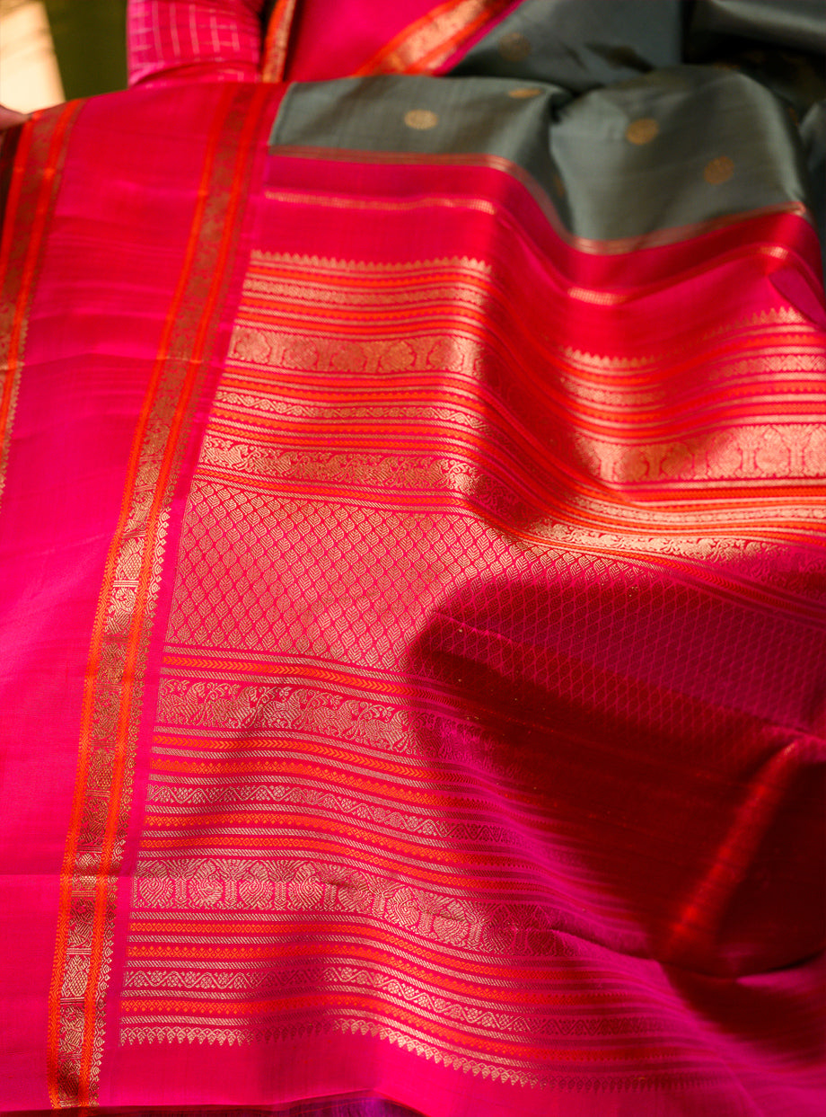 Elakkai Green and Rani Pink Korvai Kanjivaram