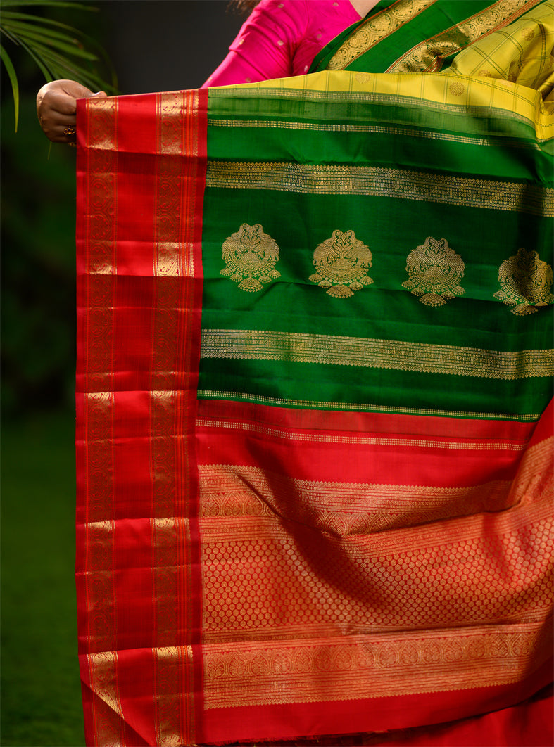 Pure silk, pure zari Kanchivaram Korvai Ganga Jamuna in Sampangi green, arakku red and emerald green.