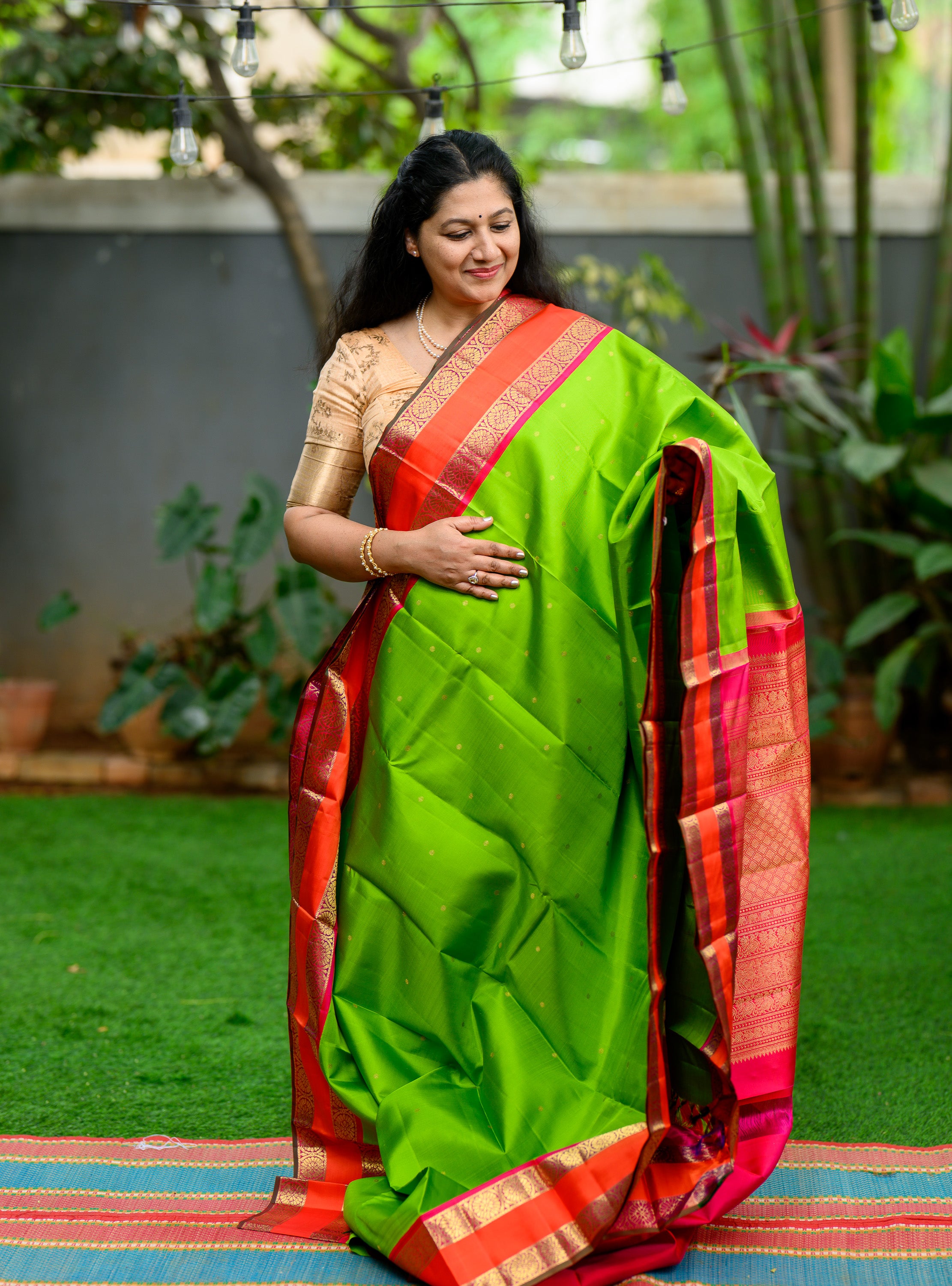 Parrot Green Korvai Kanjivaram with Pink Border
