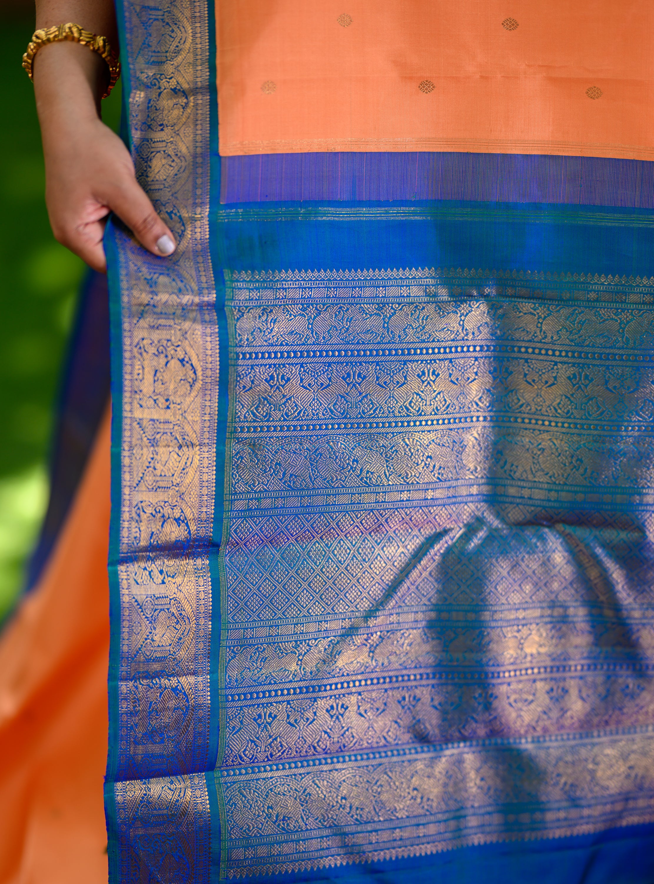 Kanakambaram and Peacock blue Korvai Kanjivaram