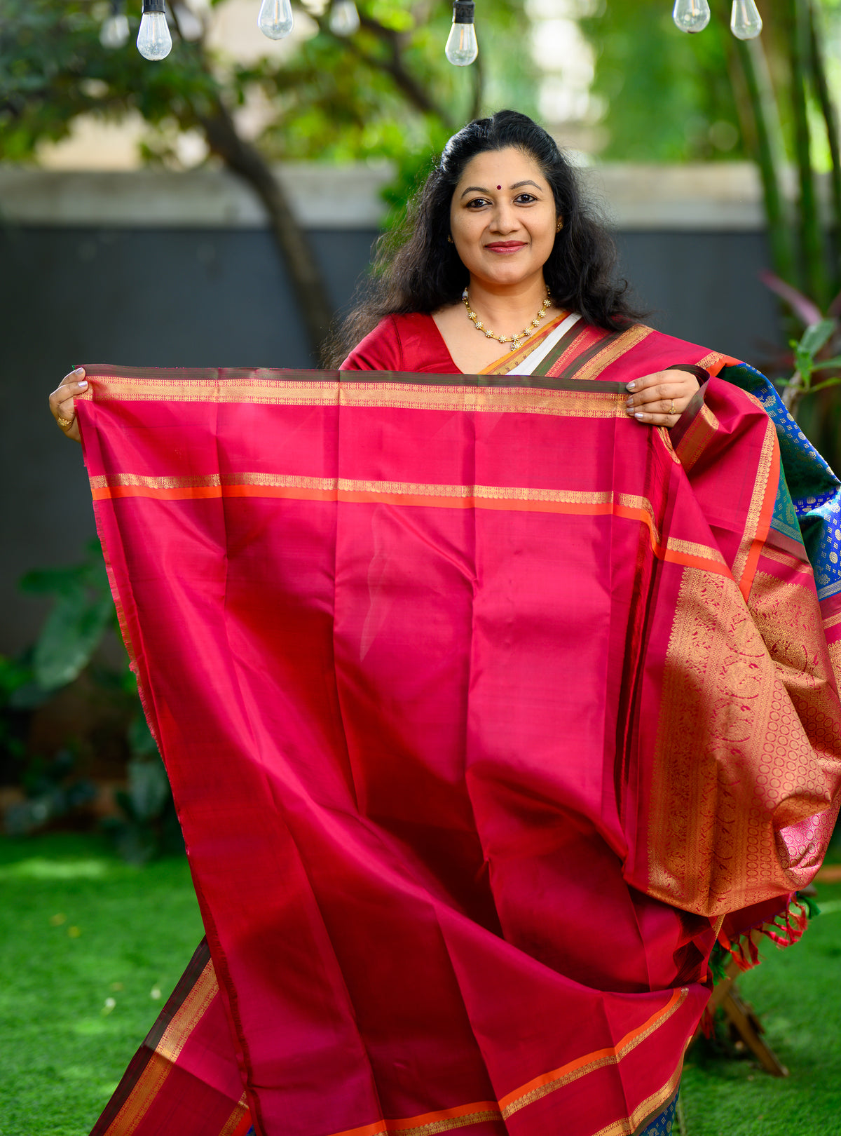 Korvai Kanjivaram with Peacock Green Body and Kalyana Arakku Border