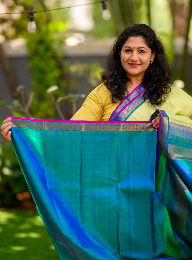 Apple green and peacock blue small border korvai kanchivaram