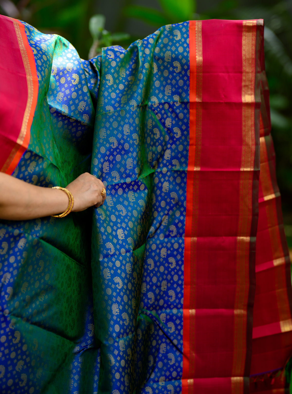 Korvai Kanjivaram with Peacock Green Body and Kalyana Arakku Border