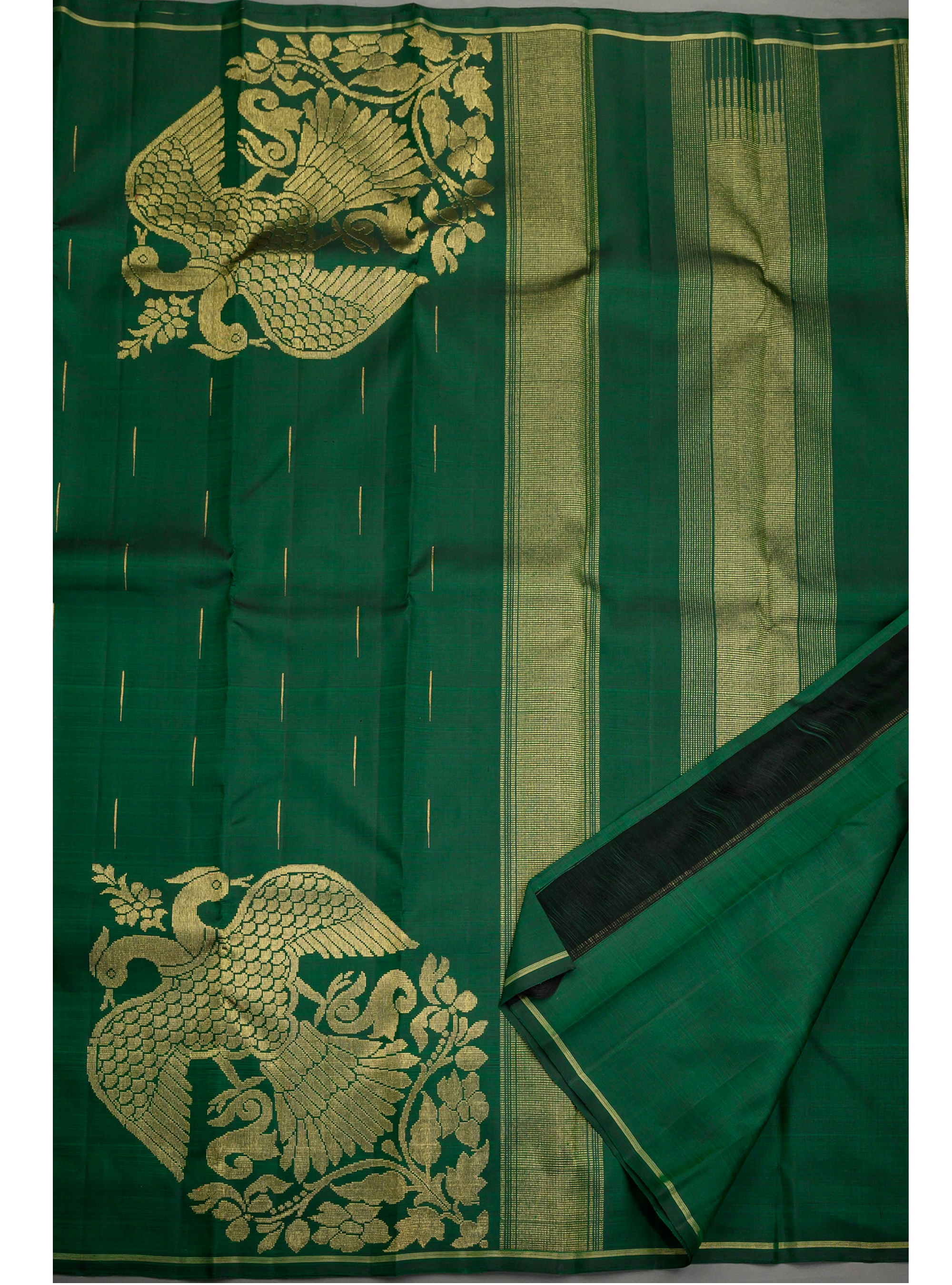 Borderless Dark Green Kanjivaram Saree with Gandaberunda corner butta
