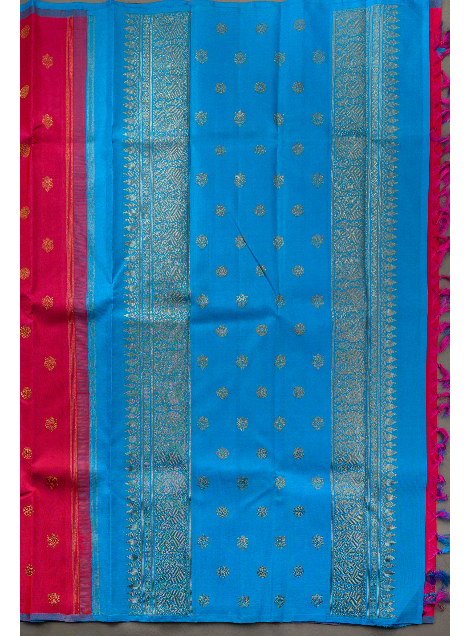 Borderless Vibrant Pink Saree with Jodi Mayil and Chakram buttas