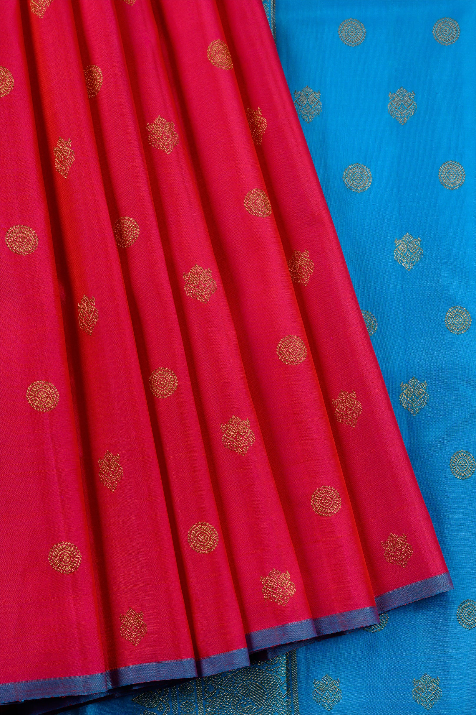 Borderless Vibrant Pink Saree with Jodi Mayil and Chakram buttas