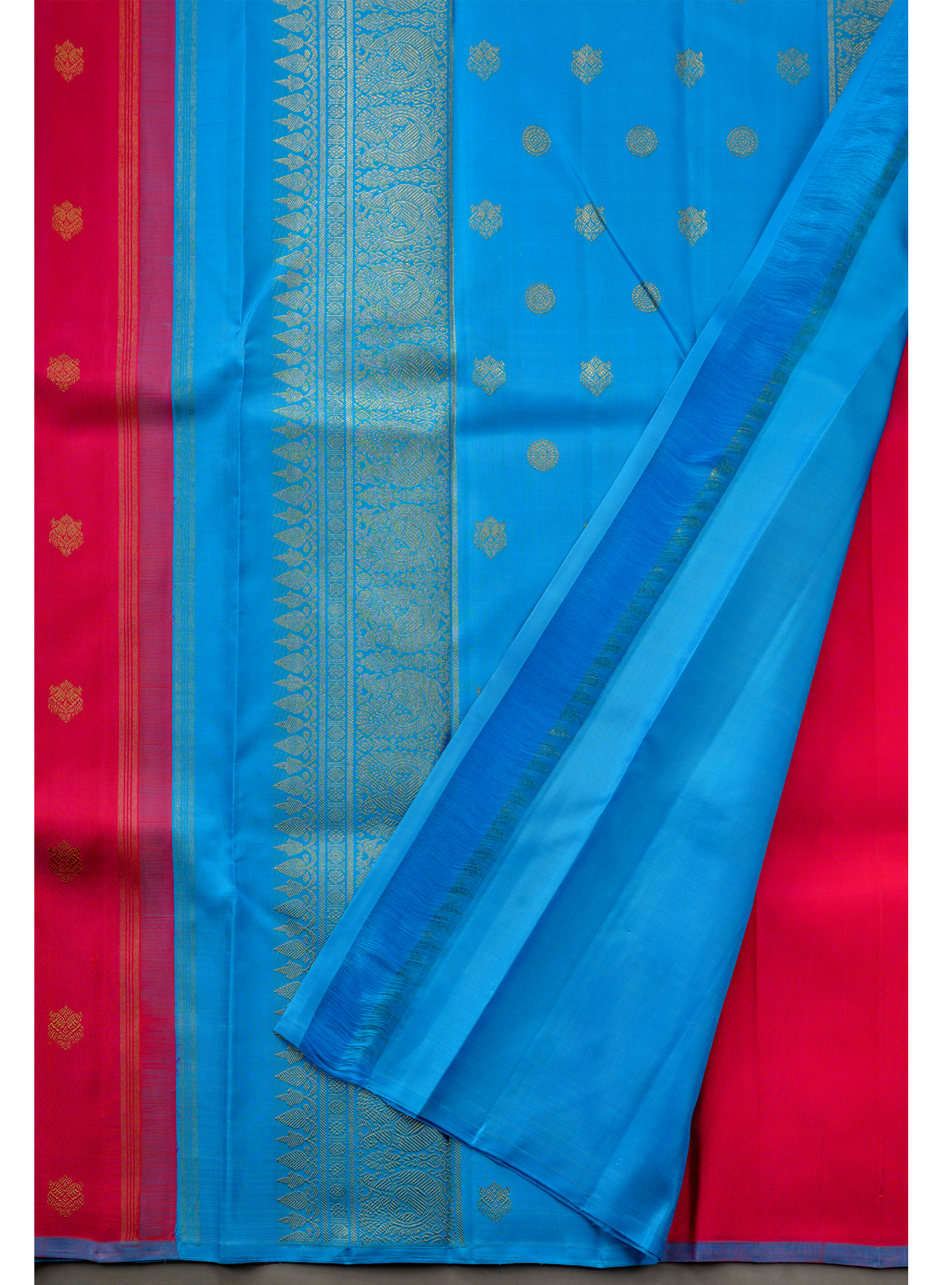 Borderless Vibrant Pink Saree with Jodi Mayil and Chakram buttas