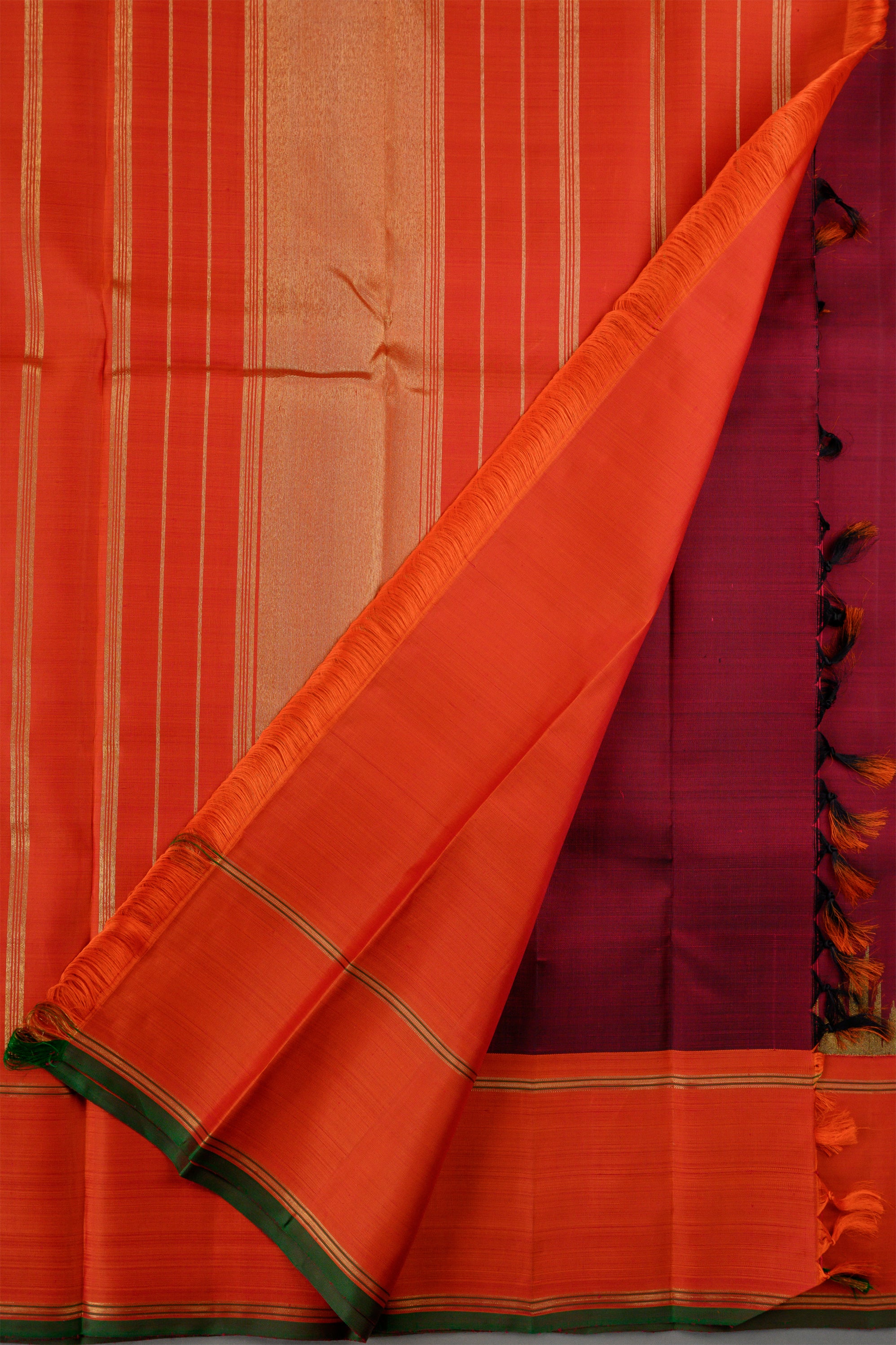Ettu kol Korvai Kanjivaram with Pakku color (reddish brown) and Orange Border