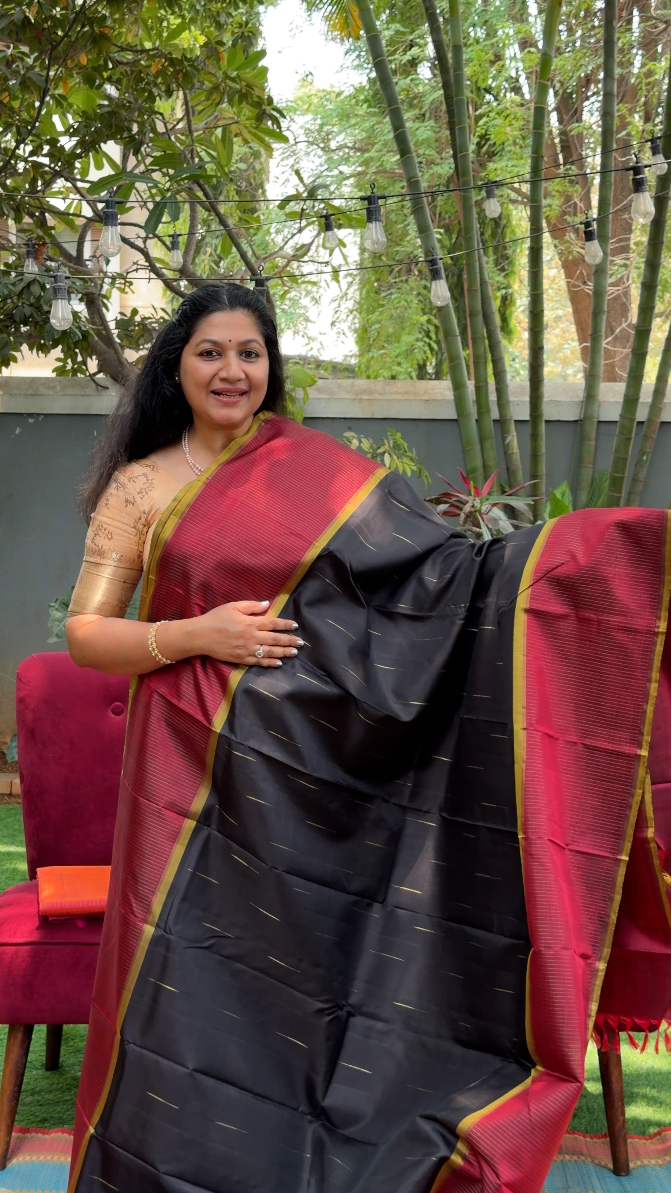 A classic Maroon and Black semi contrast Kanjivaram