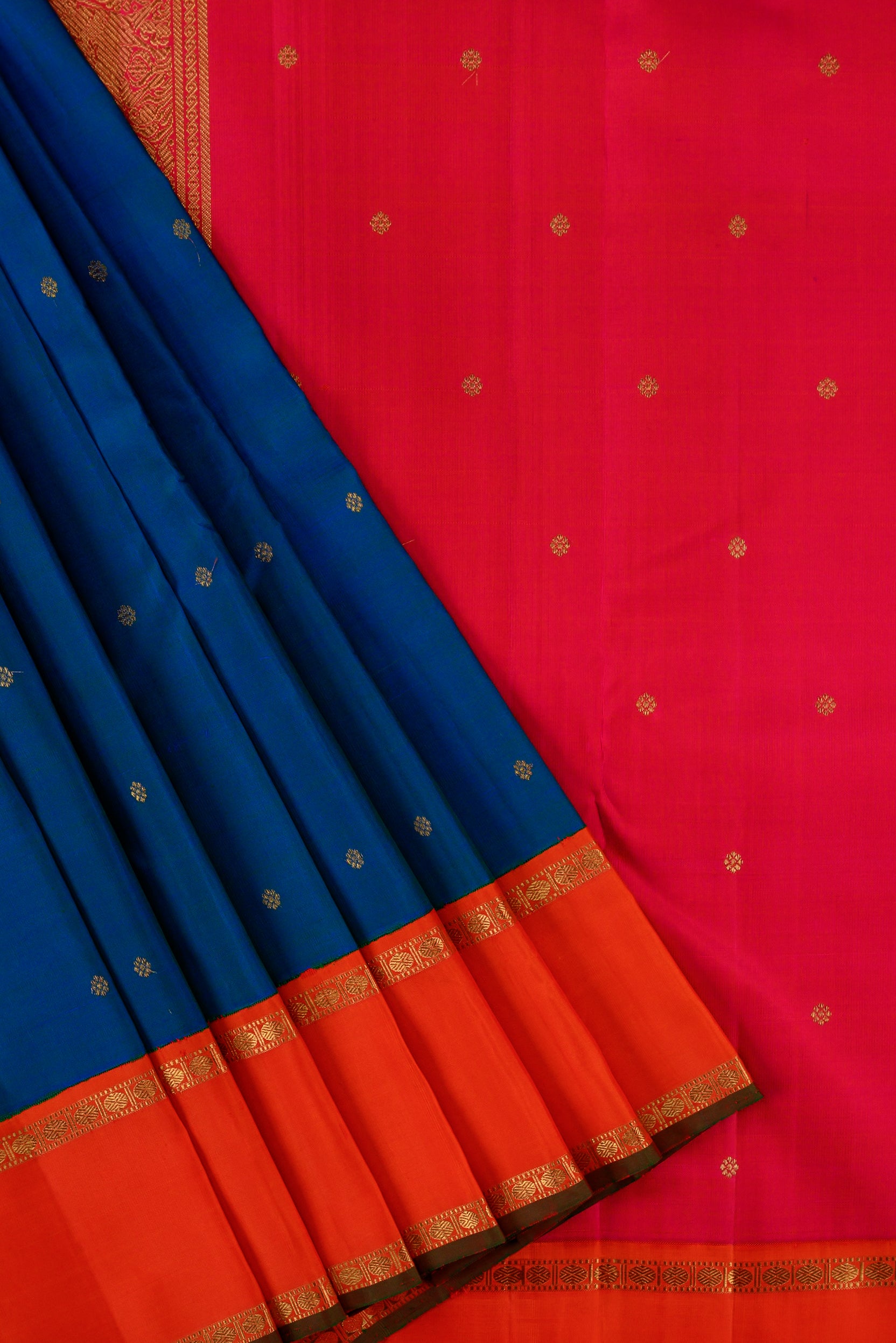 Mayilkazhuthu Blue Korvai Kanjivaram with Rettapettu Orange Border