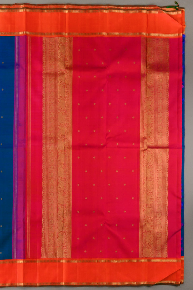 Mayilkazhuthu Blue Korvai Kanjivaram with Rettapettu Orange Border