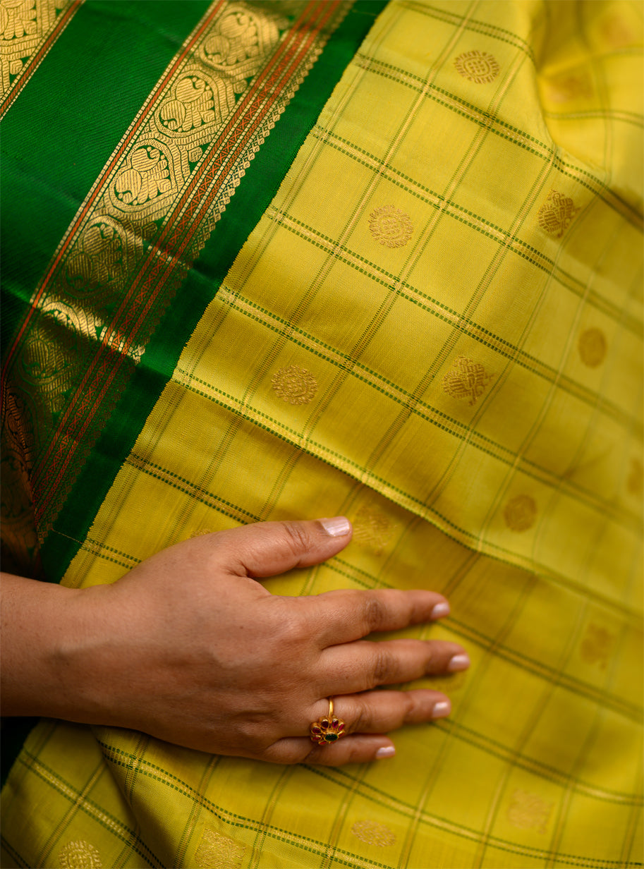 Pure silk, pure zari Kanchivaram Korvai Ganga Jamuna in Sampangi green, arakku red and emerald green.