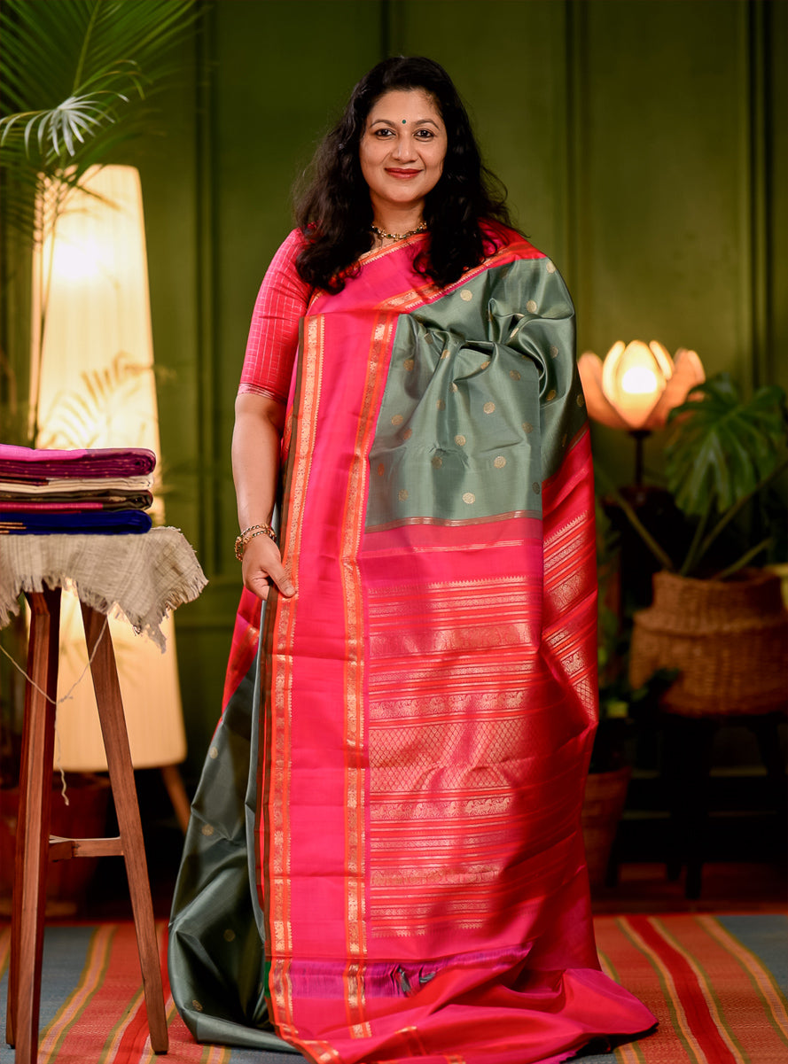 Elakkai Green and Rani Pink Korvai Kanjivaram
