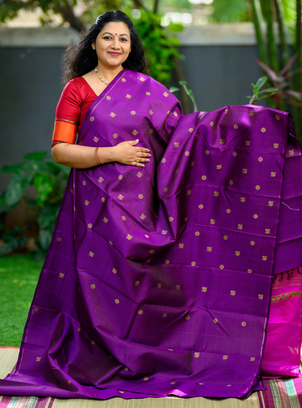 A beautiful Pure Silk Pure Zari Borderless Kanchivaram in a rich purple shade.
