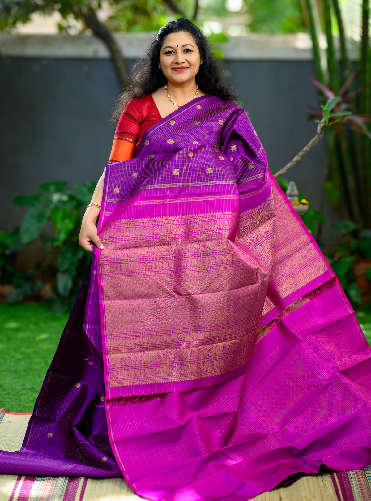 A beautiful Pure Silk Pure Zari Borderless Kanchivaram in a rich purple shade.
