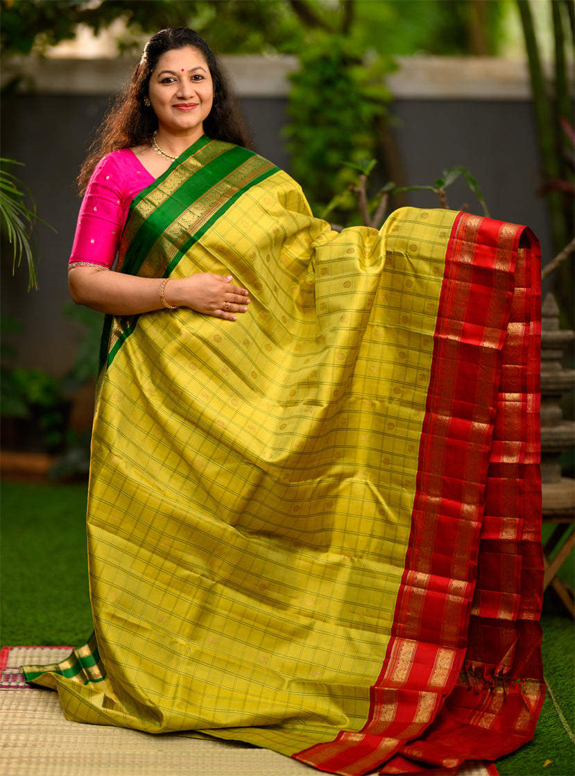 Pure silk, pure zari Kanchivaram Korvai Ganga Jamuna in Sampangi green, arakku red and emerald green.