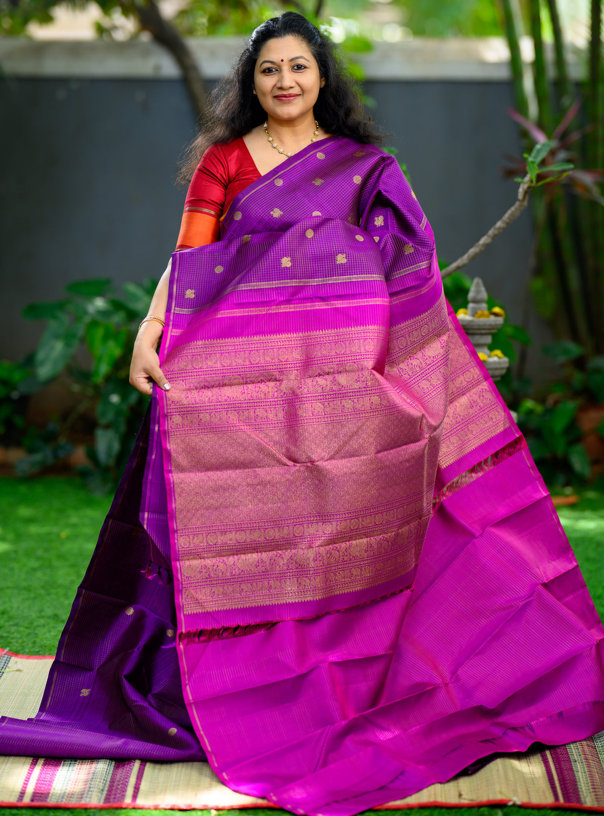 A beautiful Pure Silk Pure Zari Borderless Kanchivaram in a rich purple shade.