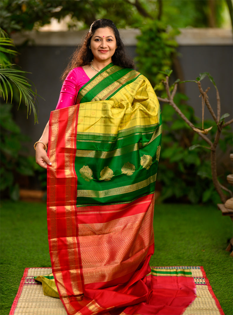 Pure silk, pure zari Kanchivaram Korvai Ganga Jamuna in Sampangi green, arakku red and emerald green.