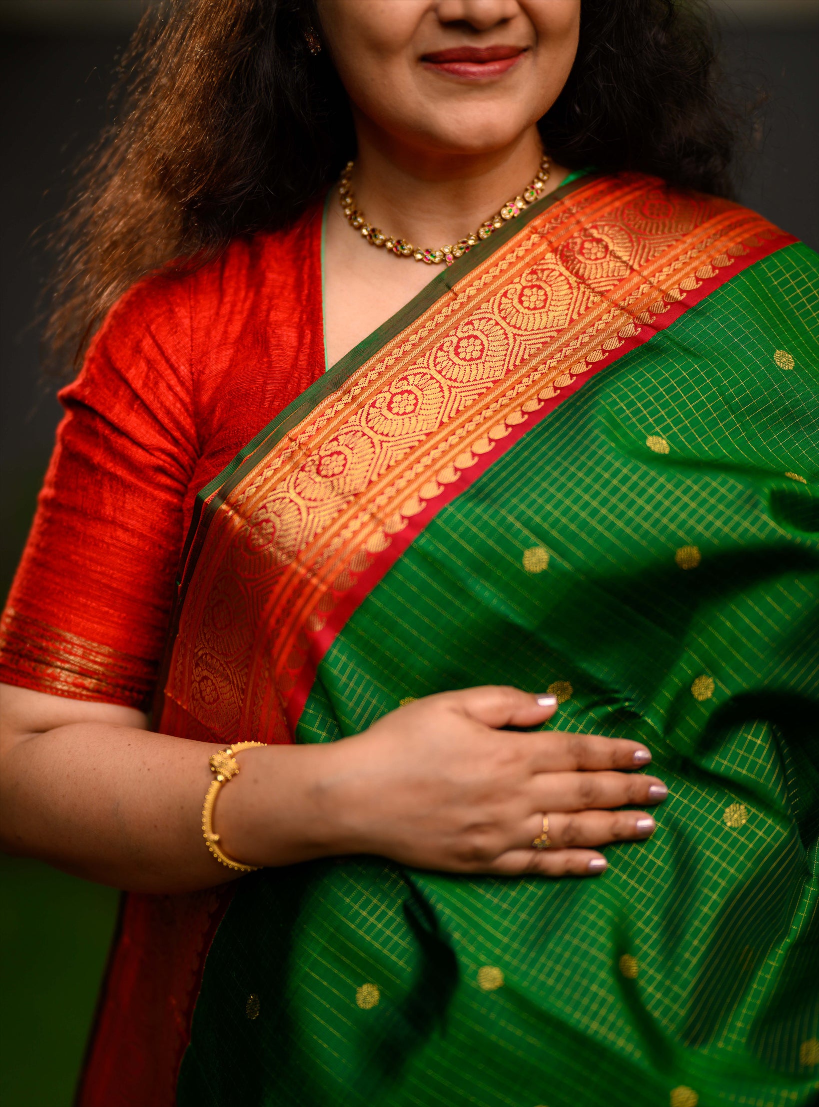 Zari kattam korvai Kanjivaram in Emerald green and Kalyana arakku.