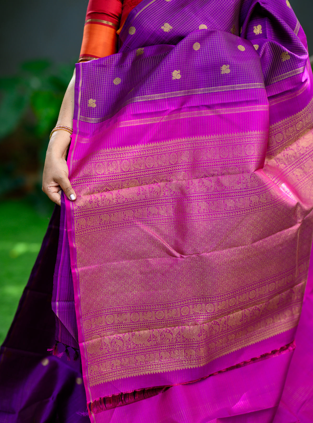 A beautiful Pure Silk Pure Zari Borderless Kanchivaram in a rich purple shade.