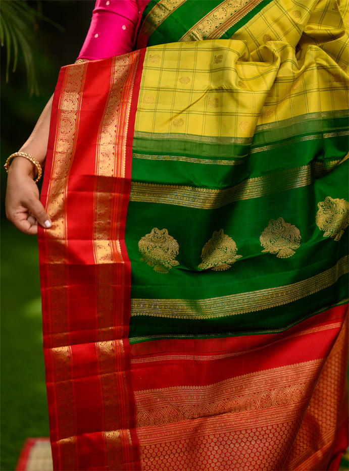 Pure silk, pure zari Kanchivaram Korvai Ganga Jamuna in Sampangi green, arakku red and emerald green.