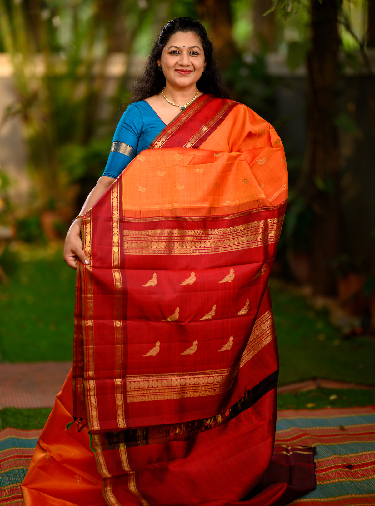 Semi Contrast Kanjivaram in Radiant Orange body with contrasting ennai arakku border
