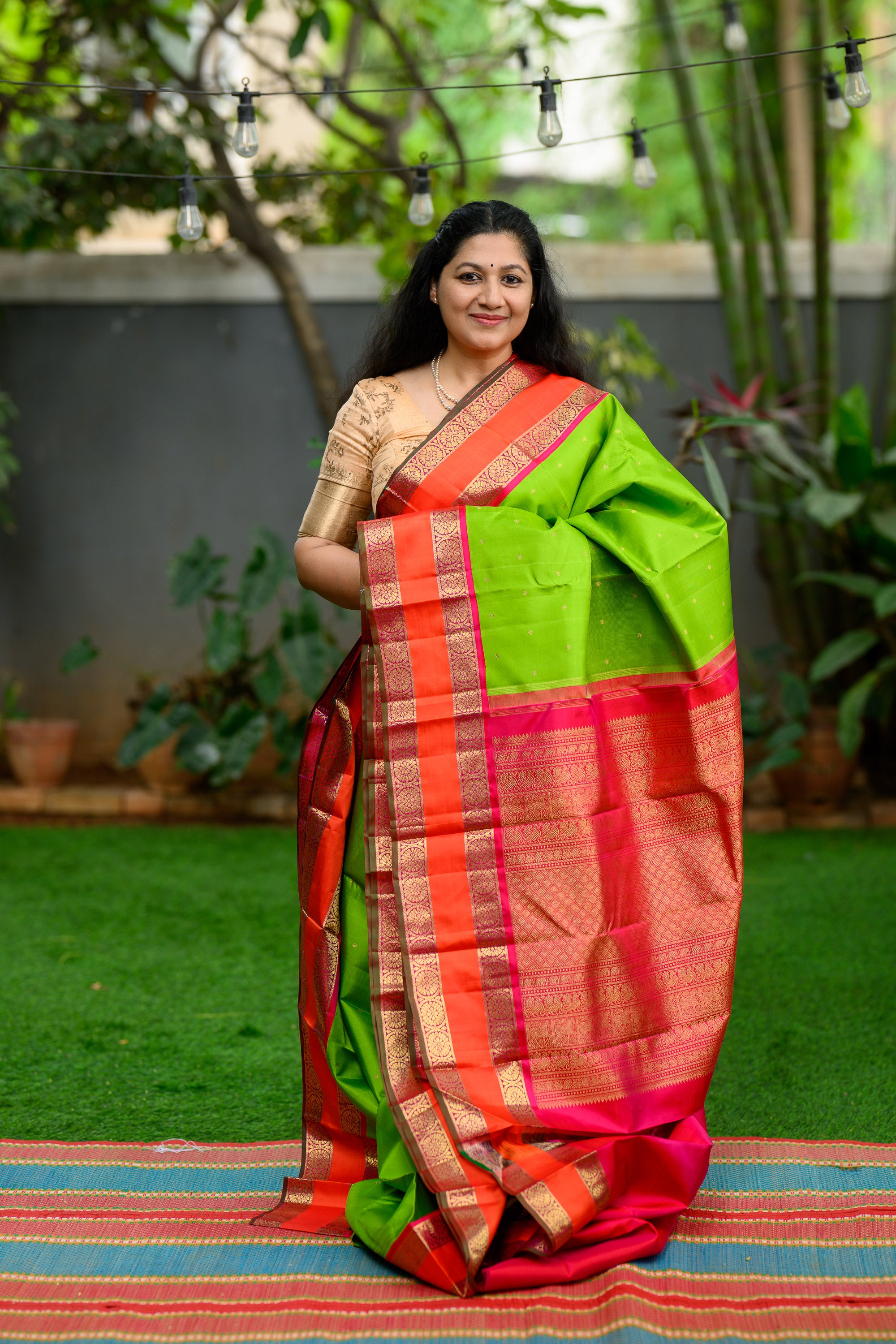 Parrot Green Korvai Kanjivaram with Pink Border