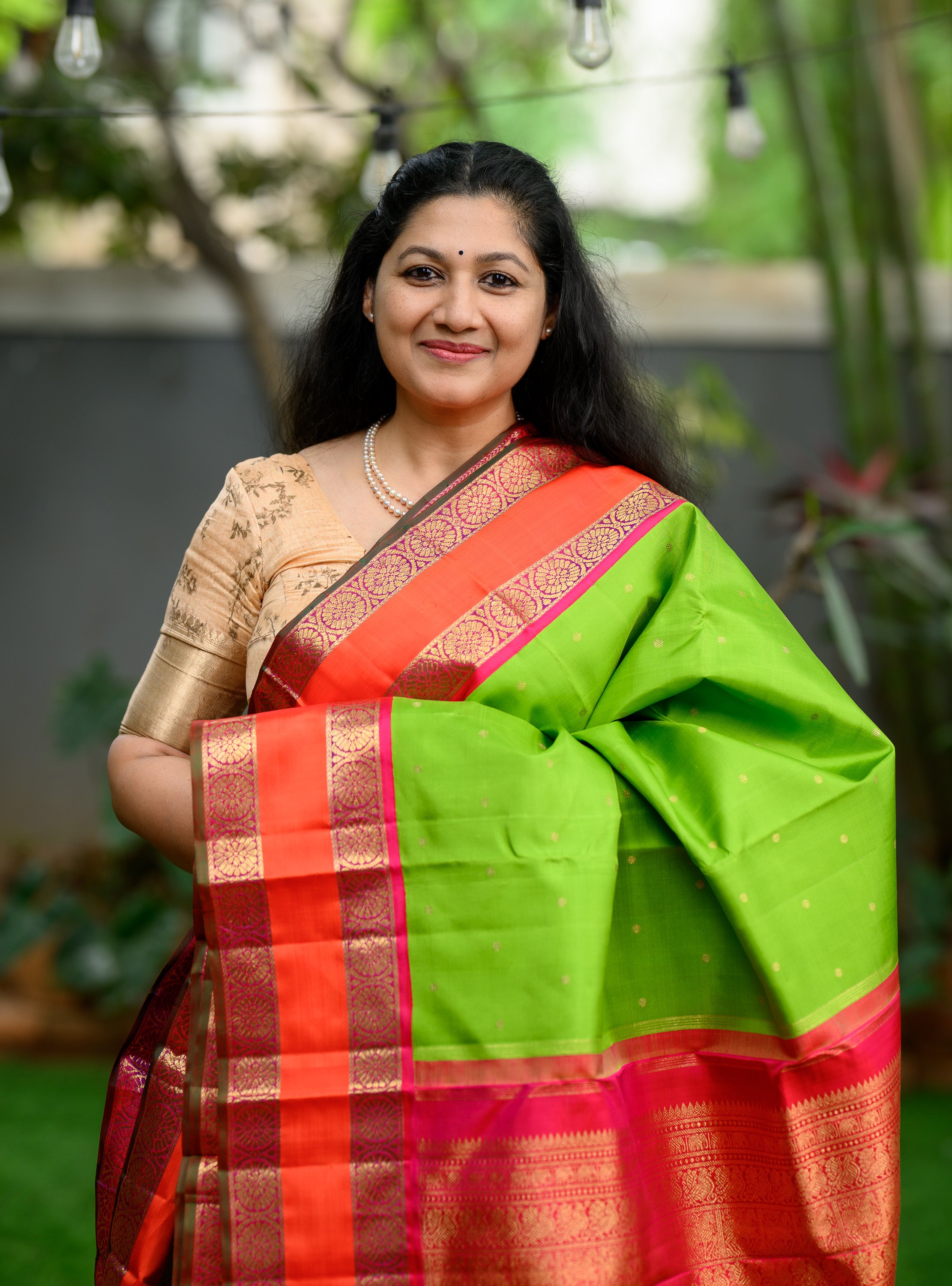 Parrot Green Korvai Kanjivaram with Pink Border